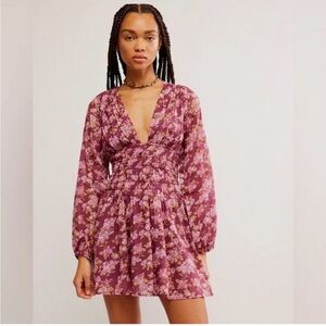 Free people New with tags!! Floral Long Sleeve top. Brand new